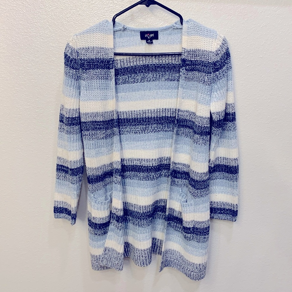 This is a cardigen for girls, size medium!